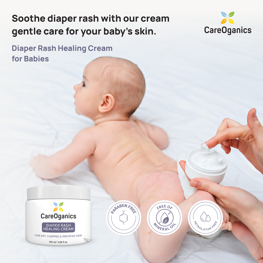 CareOganics diaper rash healing cream for babies with a baby and a hand applying the cream.